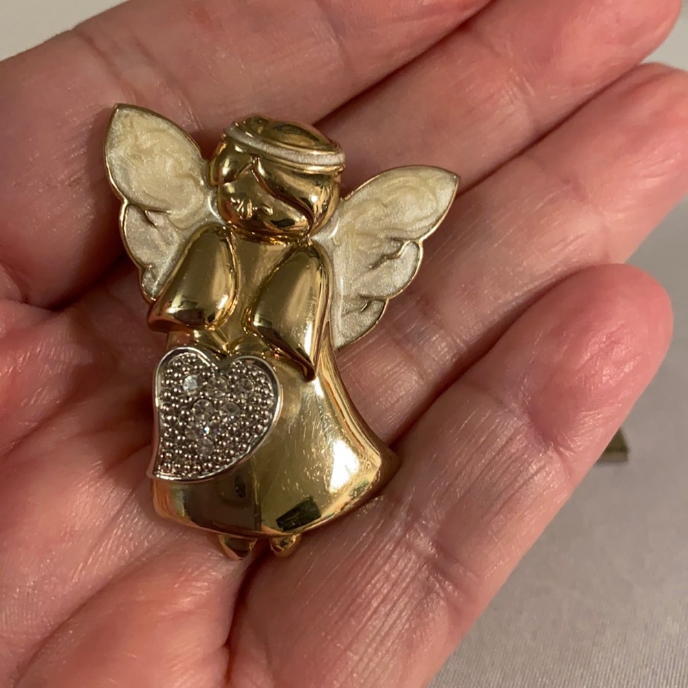 Angel pin brooch enameled wings and halo holding a heart rhinestones